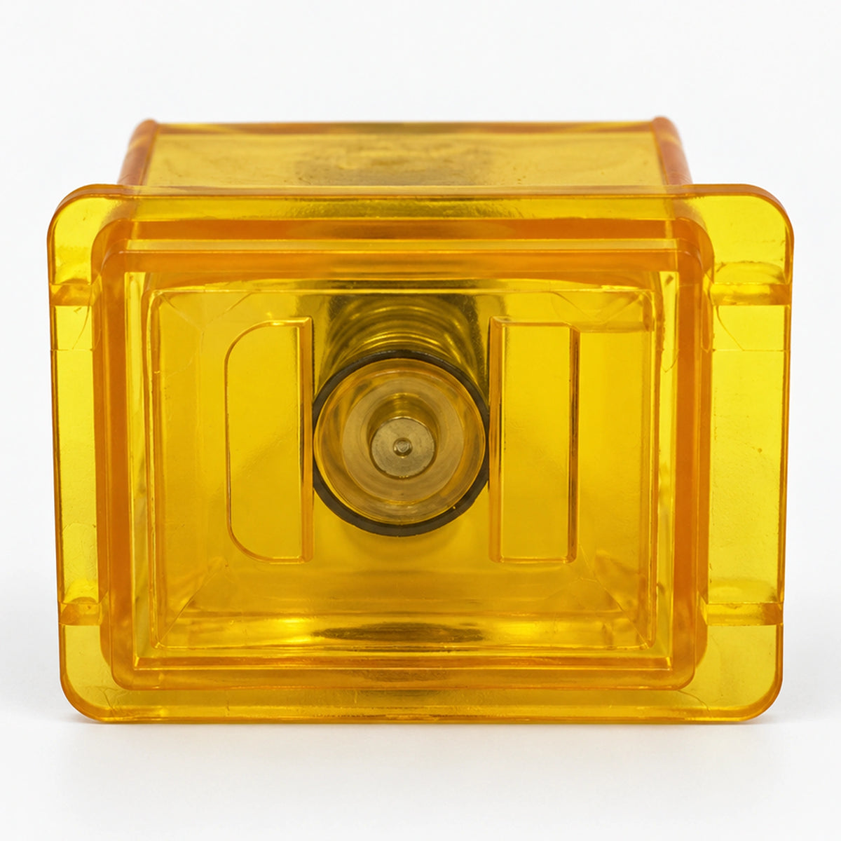 Translucent yellow coin door button with a rectangular face and projecting rear plunger.