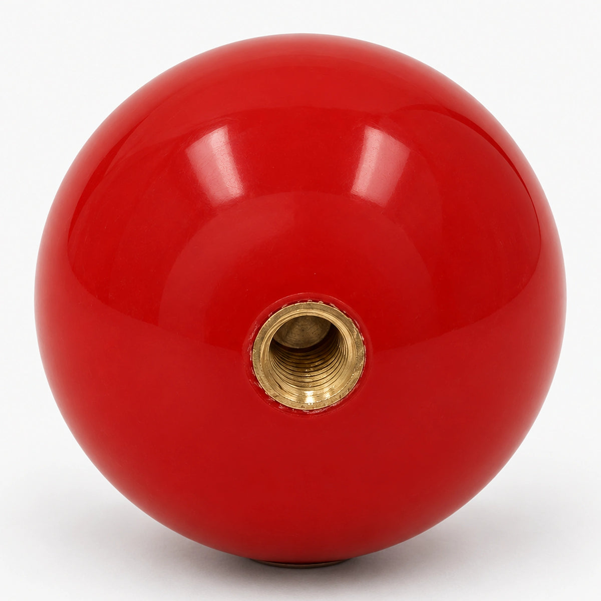 Underside of a red arcade joystick ball top showing the metal threaded insert.