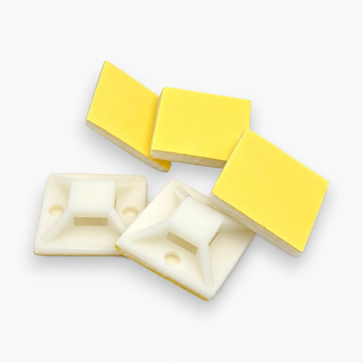25mm adhesive cable tie mounts showing 4-way tie channels, screw holes and yellow adhesive liner