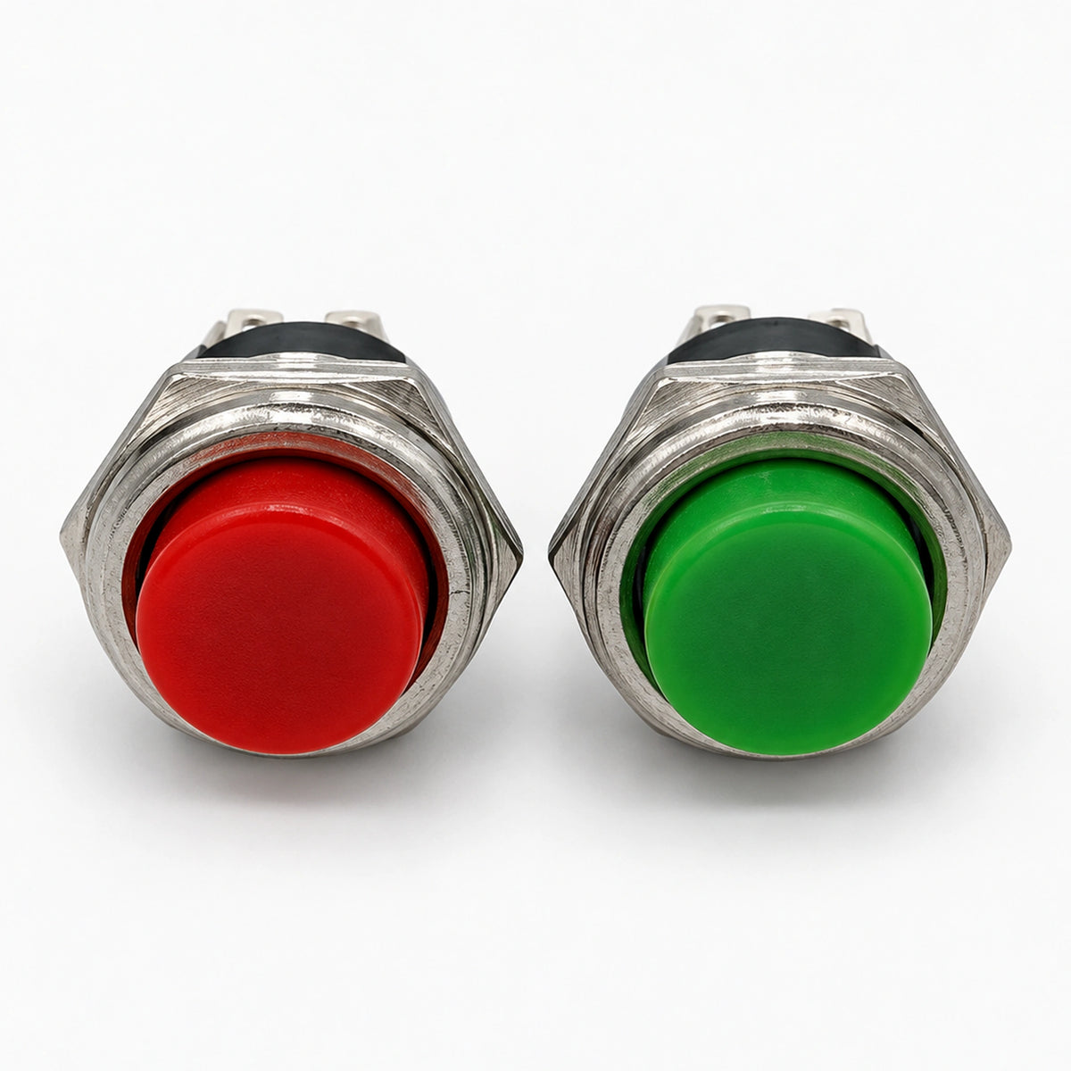 PS-212 push button switches showing red and green buttons with silver-colored metal housings.