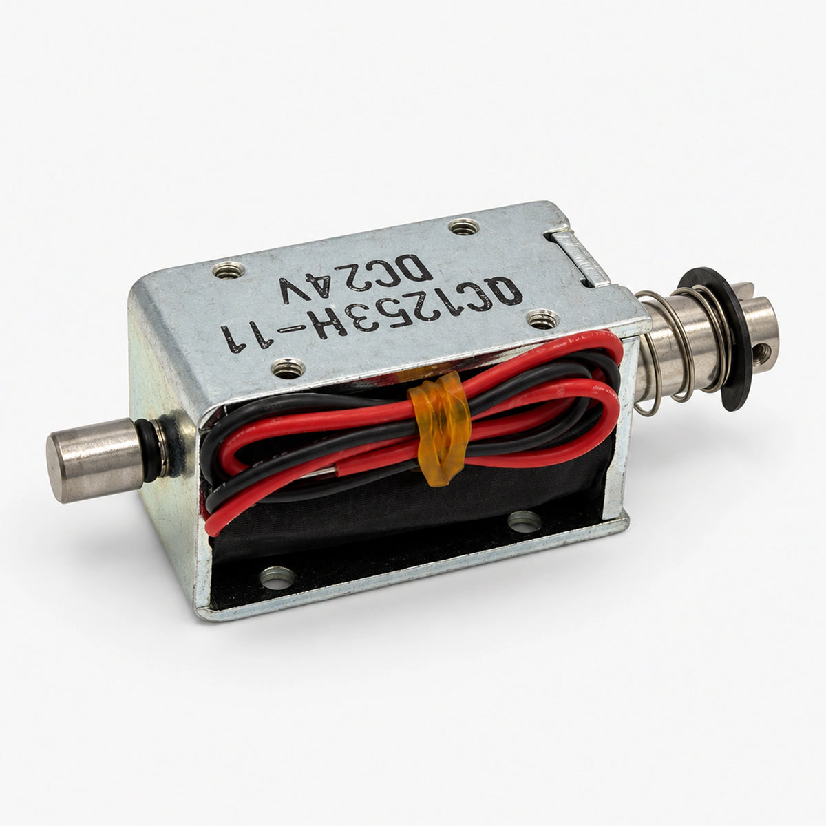 QC1253H-11 24V DC solenoid with silver-colored frame, forked plunger end, return spring and red and black wires.