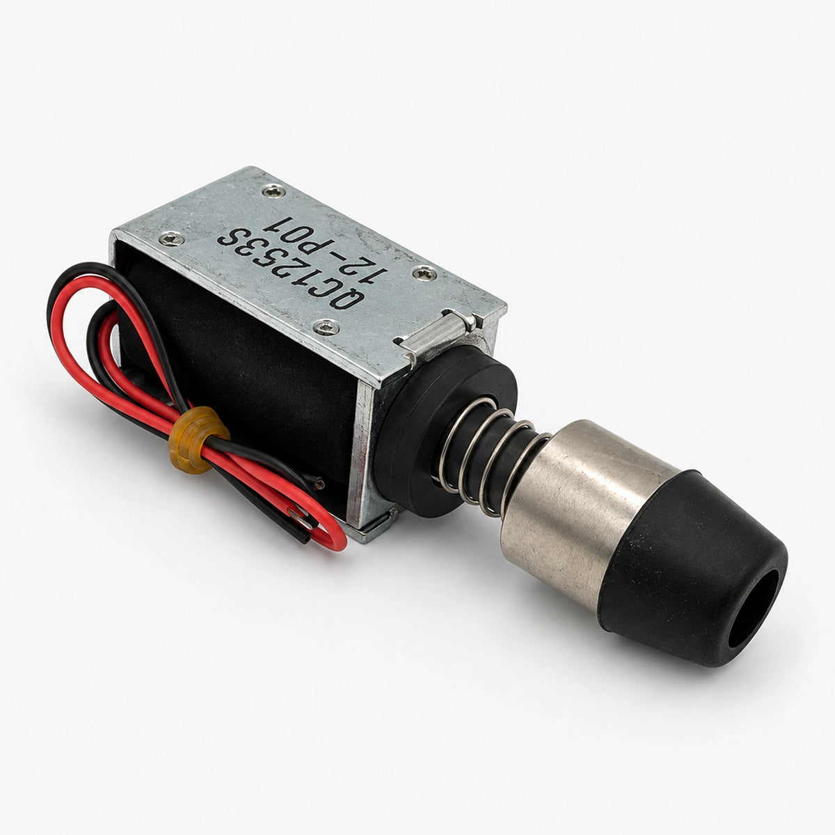 QC1253S 12V DC solenoid with silver-colored frame, red and black wires, return spring and cylindrical black-capped end.