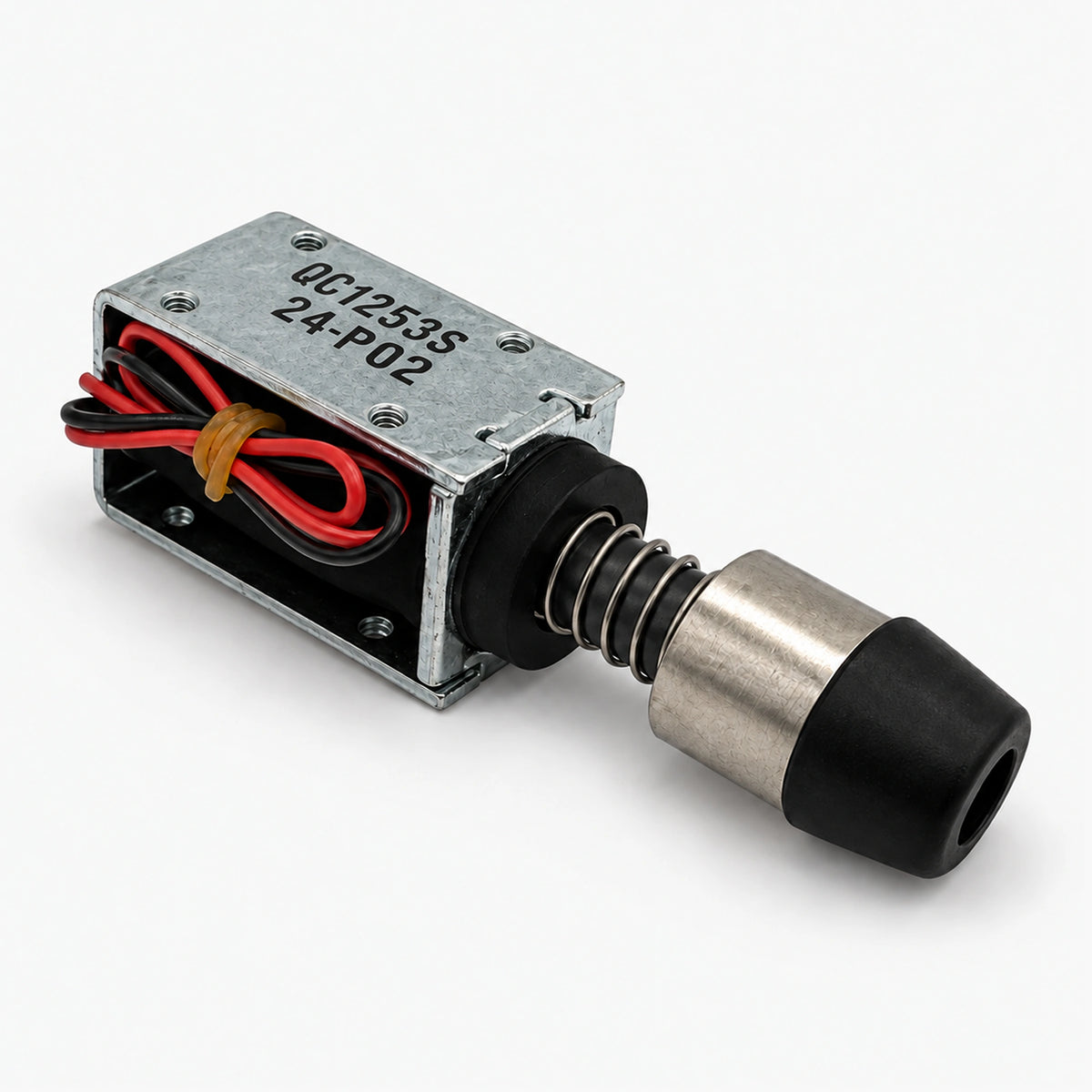 QC1253S 24V DC solenoid with silver-colored frame, return spring, red and black wires, and black-capped end.