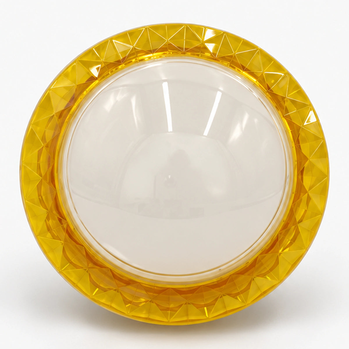 Large round arcade button showing its yellow threaded shaft and white housing 